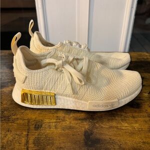 Adidas NMD R1 Off White and Gold Runner Sneakers
Size 7